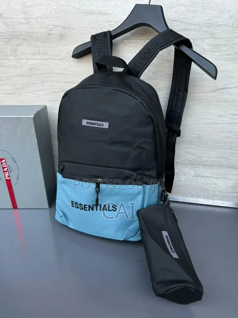 Unisex Fear of God Essentials Backpacks Black, Olive, and Red.