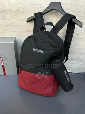 Unisex Fear of God Essentials Backpacks Black, Olive, and Red.