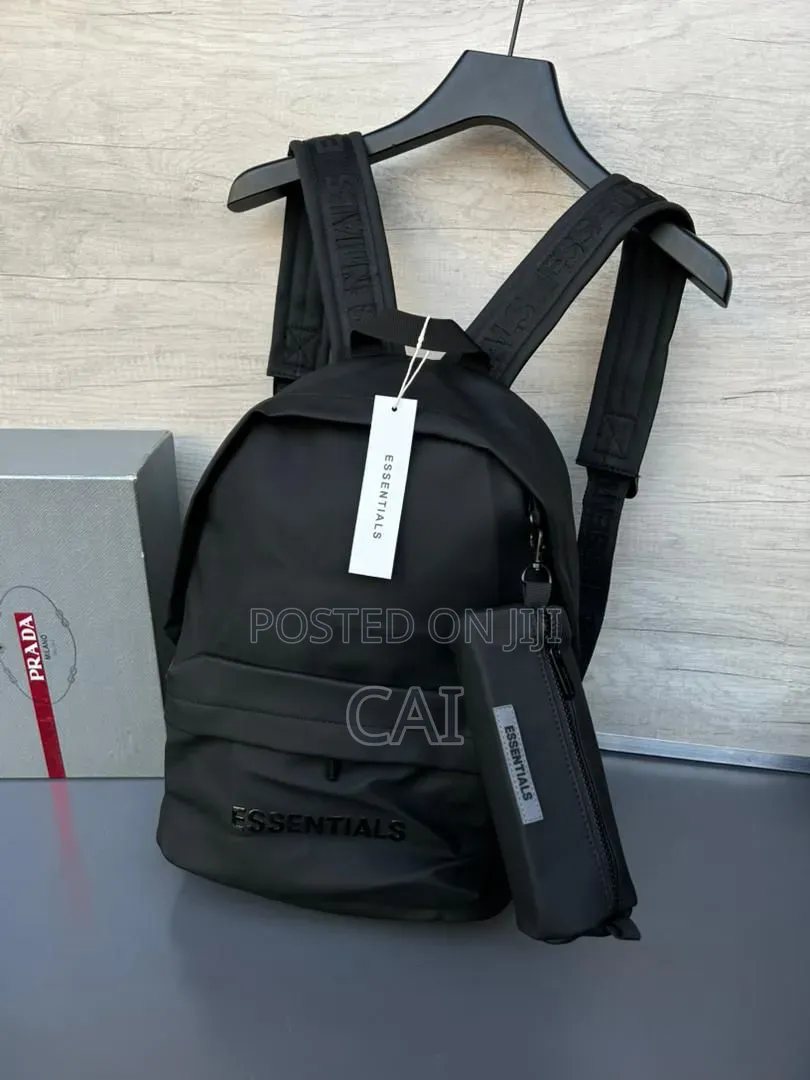 Unisex Fear of God Essentials Backpacks Black, Olive, and Red.