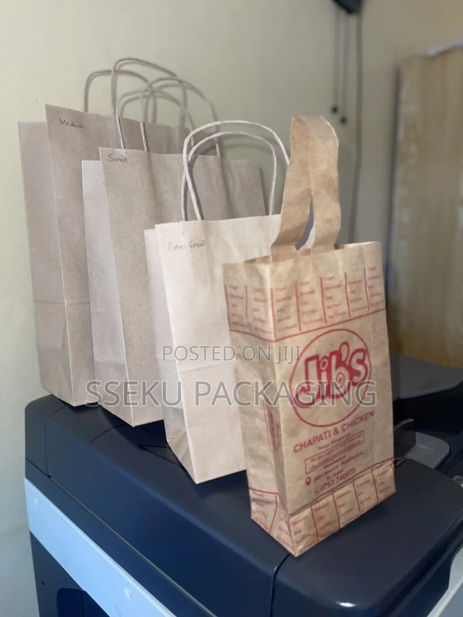 100pcs Paper Bags Branded And In Branded From A4 Size.