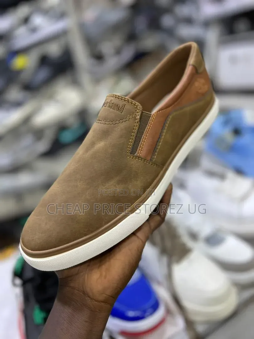 This Is a Timberland Men's Casual Brown Leather With a White Sole