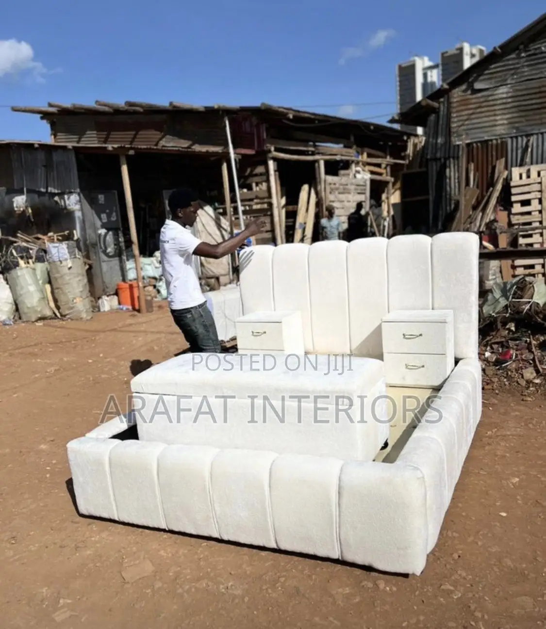 Elegant Panelled Fabric Upholstery Design With Ottoman