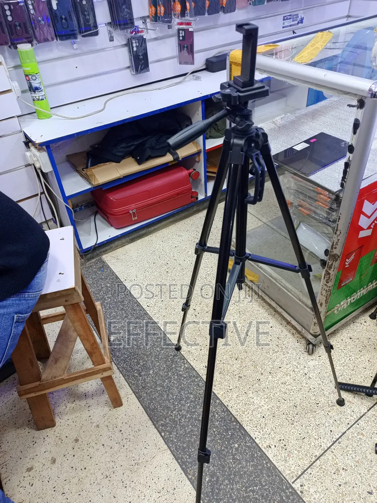 Professional Portable Camera Tripod With a Phone Holder Mount.