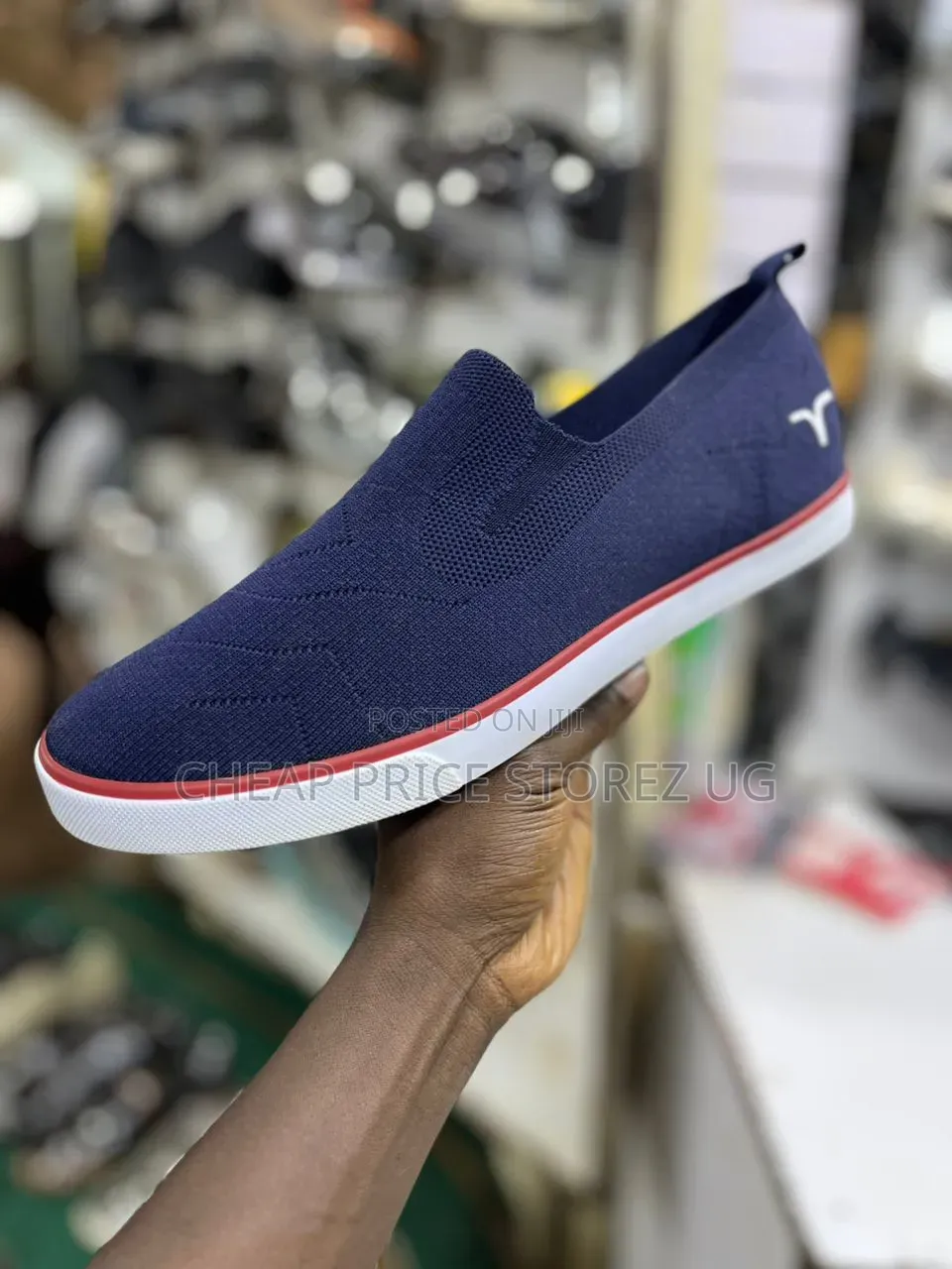 These Are Blue Slip-on Knit Sneakers Featuring a White Rubber