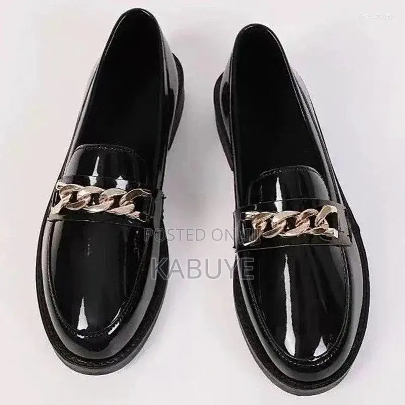 Black Patent Loafers Featuring a Chunky Sole