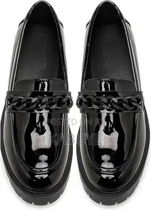 Black Patent Loafers Featuring a Chunky Sole
