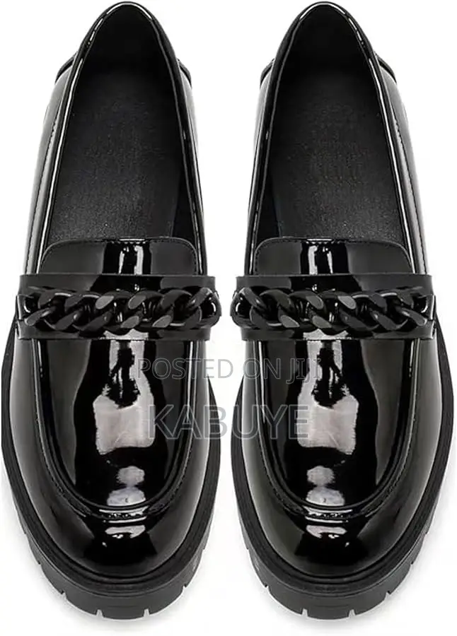 Black Patent Loafers Featuring a Chunky Sole