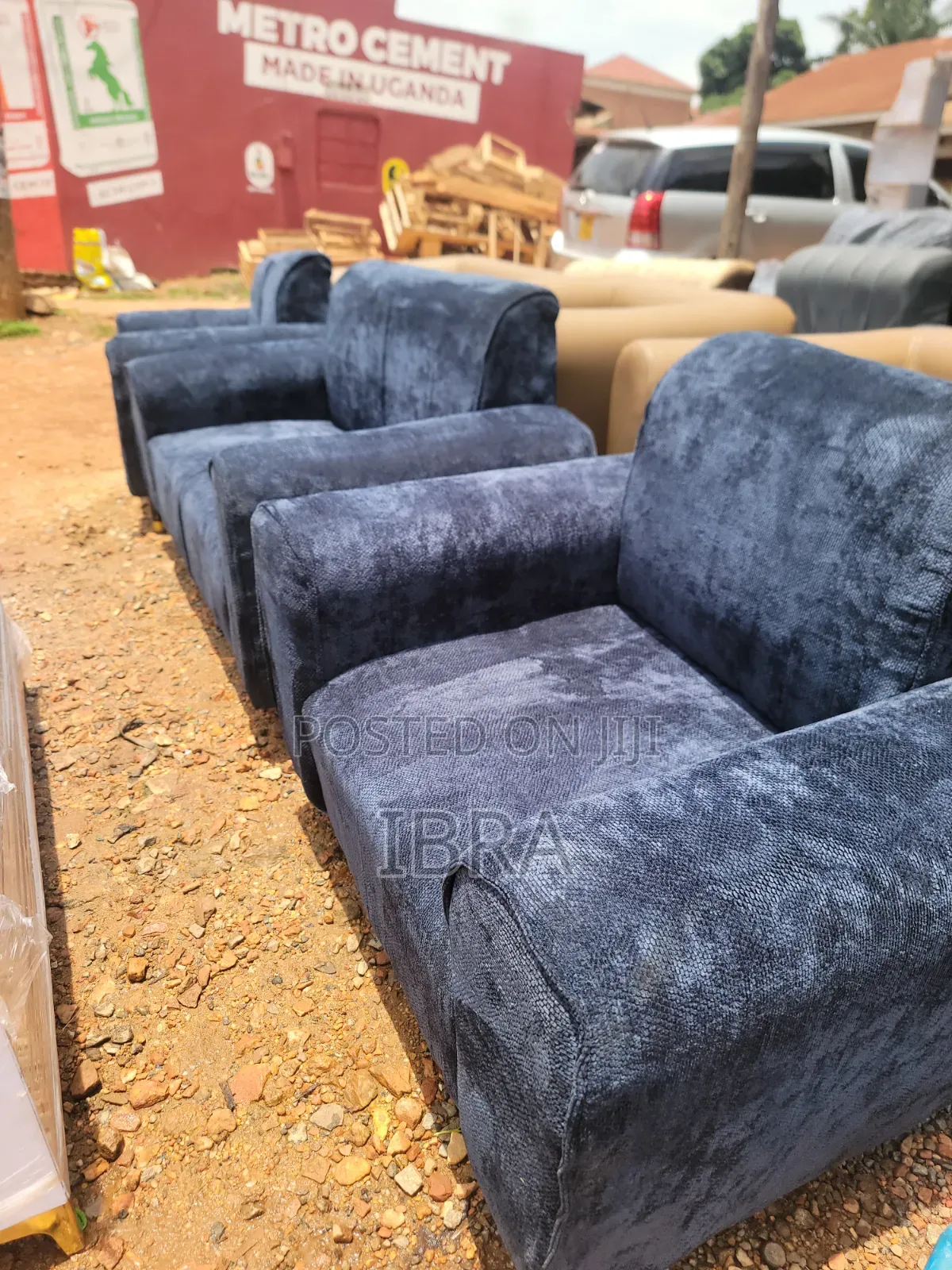 A Bleu Sofa Set With Golden Stands