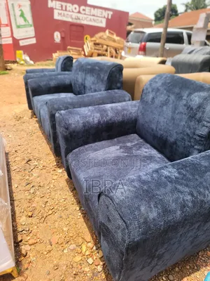 A Bleu Sofa Set With Golden Stands