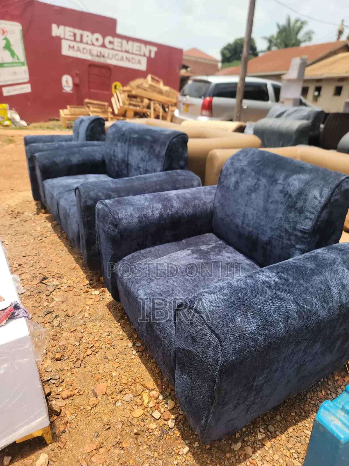 A Bleu Sofa Set With Golden Stands