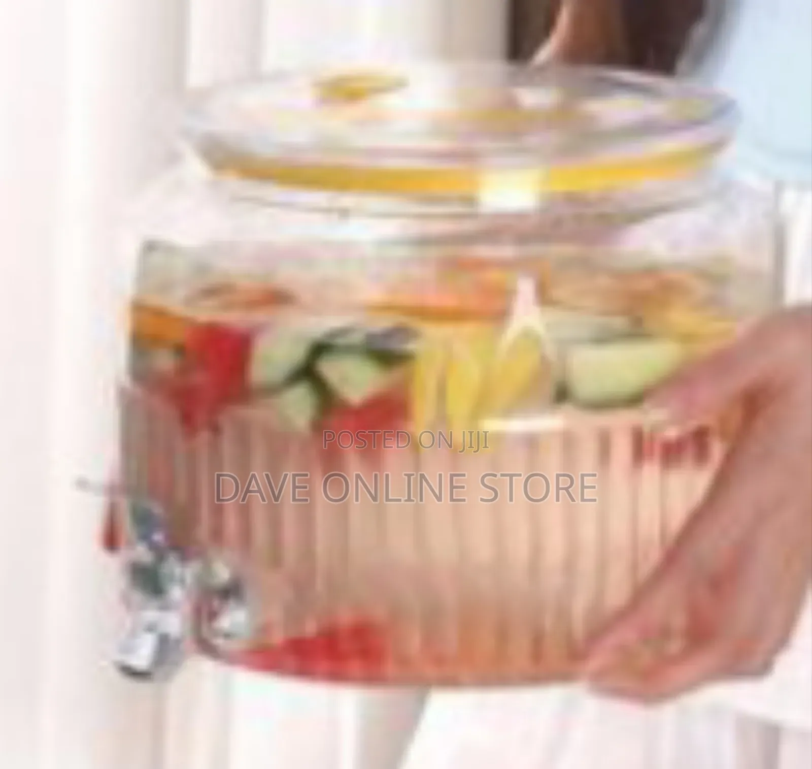 Ribbed Glass Beverage Dispenser With A Spigot