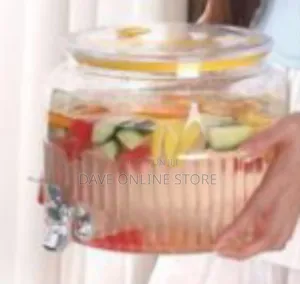 Ribbed Glass Beverage Dispenser With A Spigot