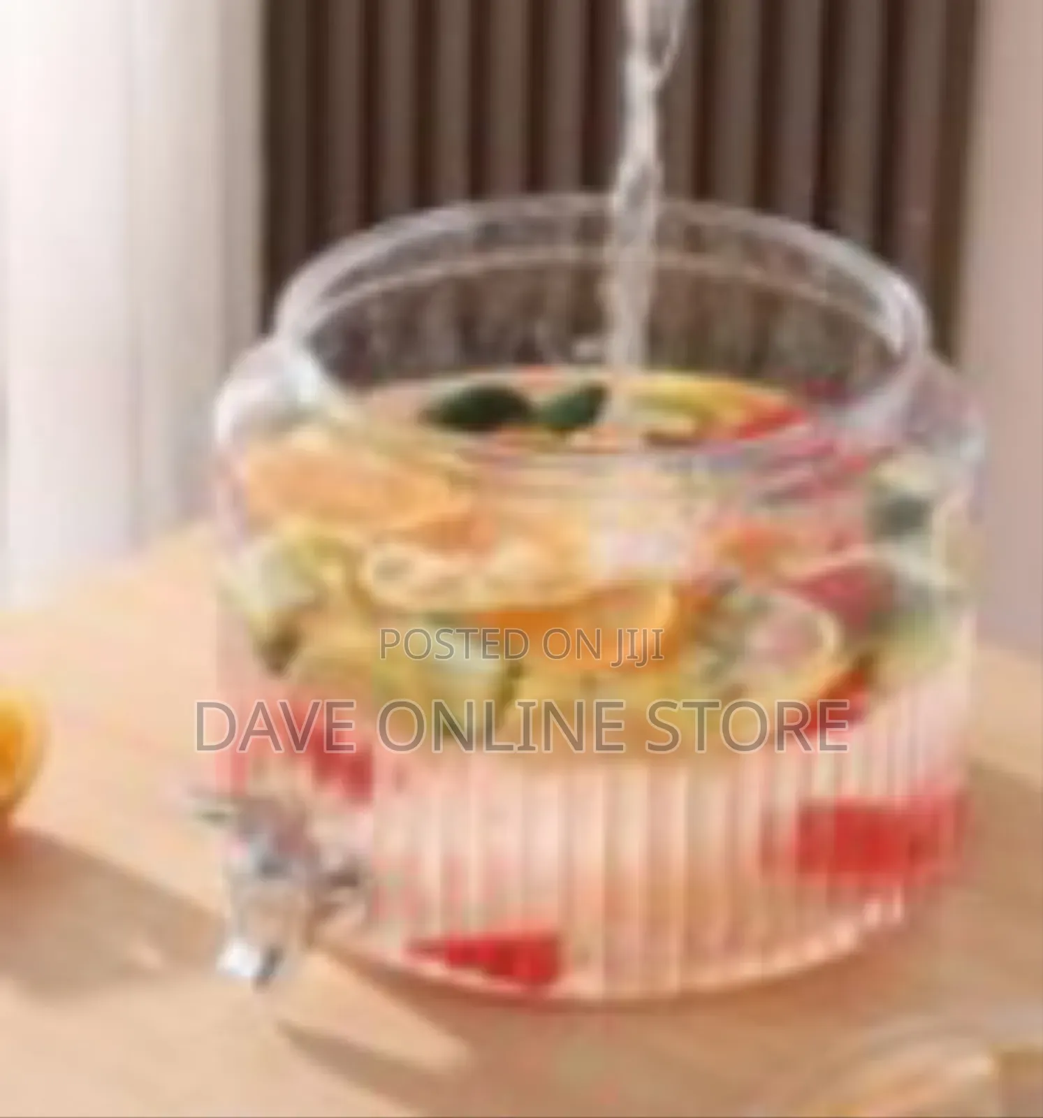 Ribbed Glass Beverage Dispenser With A Spigot