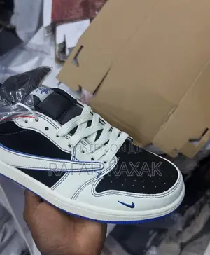 White ,Black,And Blue Nike Air Jordan 1 Low Sneakers