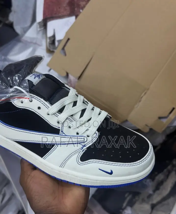 White ,Black,And Blue Nike Air Jordan 1 Low Sneakers