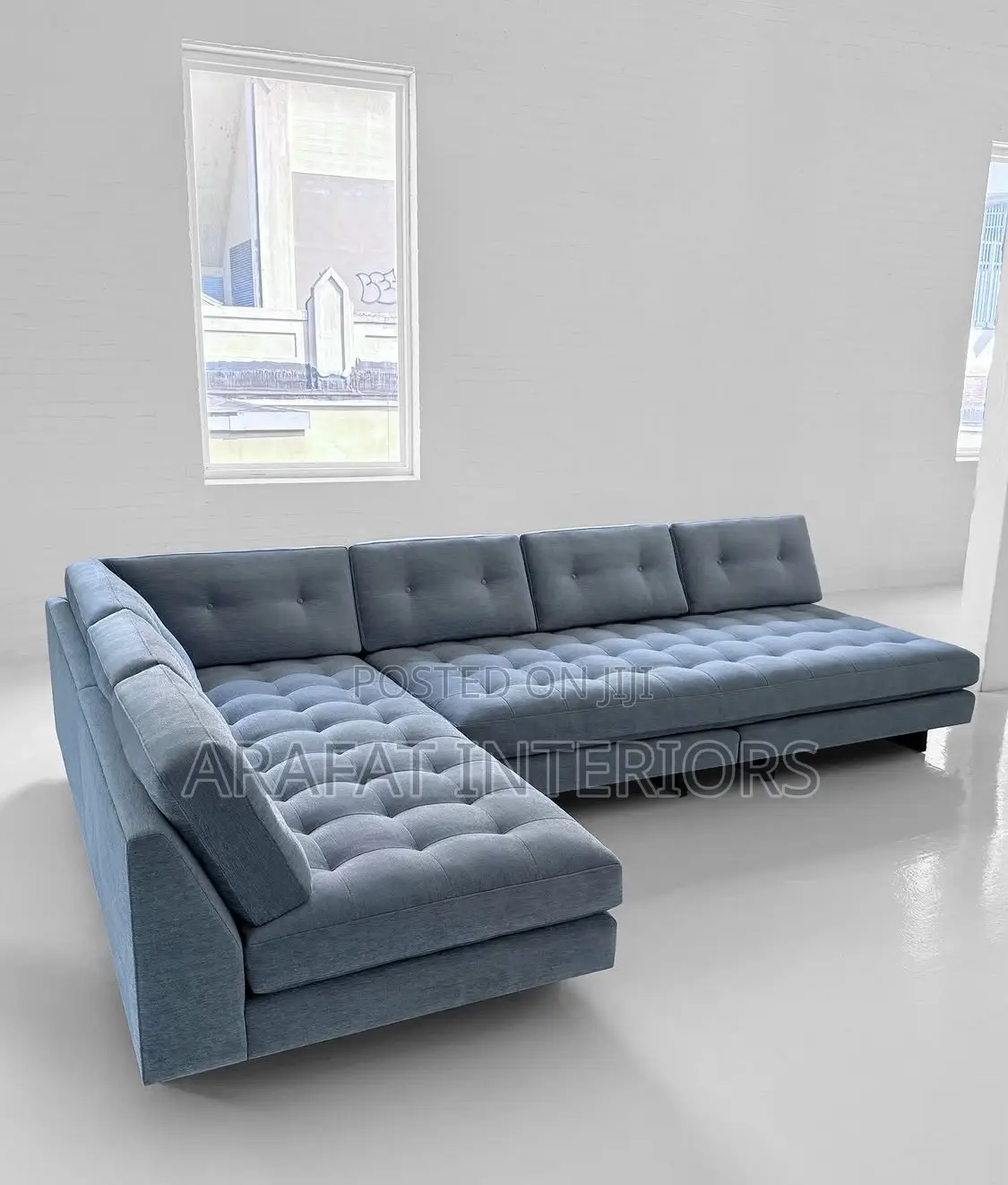 Tufted L-Sectional in Elegant Blue-Grey.