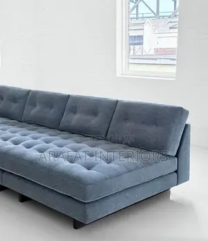 Tufted L-Sectional in Elegant Blue-Grey.