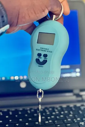 50 Kg Digital Portable Weighing Scale- Multicolour