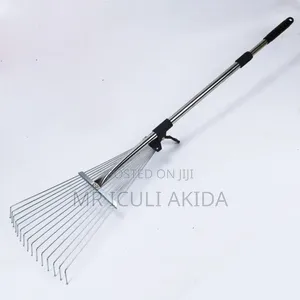 Telescopic Metal Garden Rake for Clearing Lawn and Yard Debris.