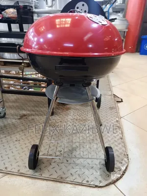 Round Portable Charcoal Barbecue Grill.