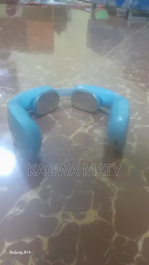Electric Neck Massager - Smart Pulse Heat Therapy (Light Blue)