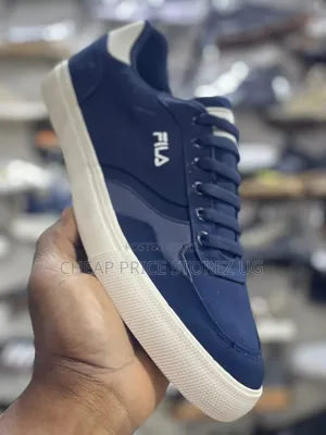 Fila Blue Canvas Slip-on Sneakers.