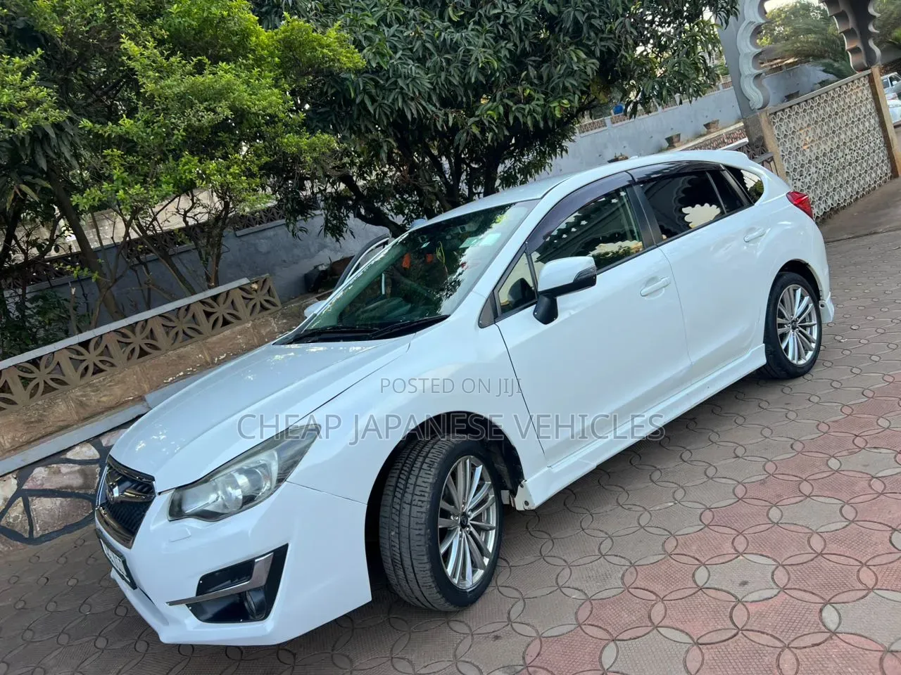 Subaru Impreza 2.0i PZEV 4dr Hatchback AWD (2.0L 4cyl CVT) 2015 White
