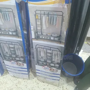 Heavy - Duty Metal Double Clothes Rack With Shelves and Wheels(68)
