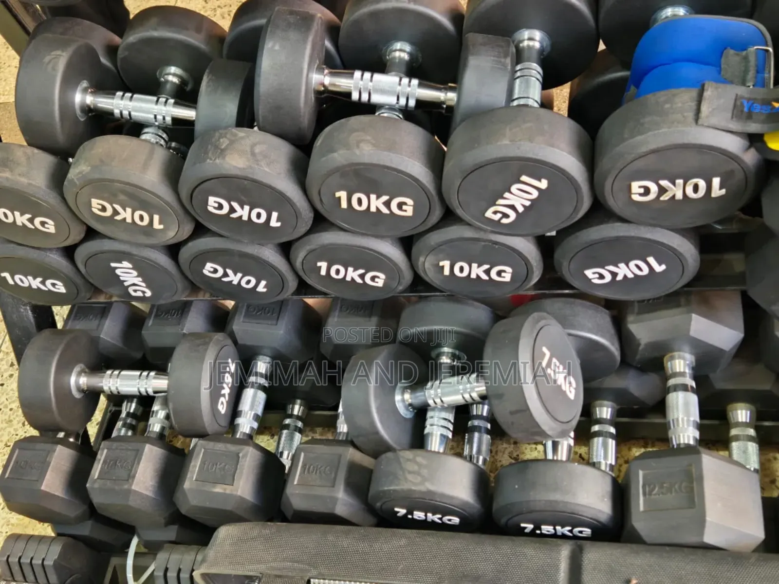 Apair of Home Exercise Dumb Bells