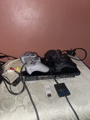 Ps2 Full Set With 7 Games and Brand Mew Controller