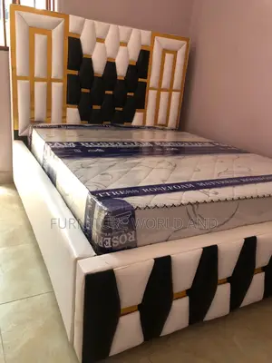 A Black and White Fabric Bed