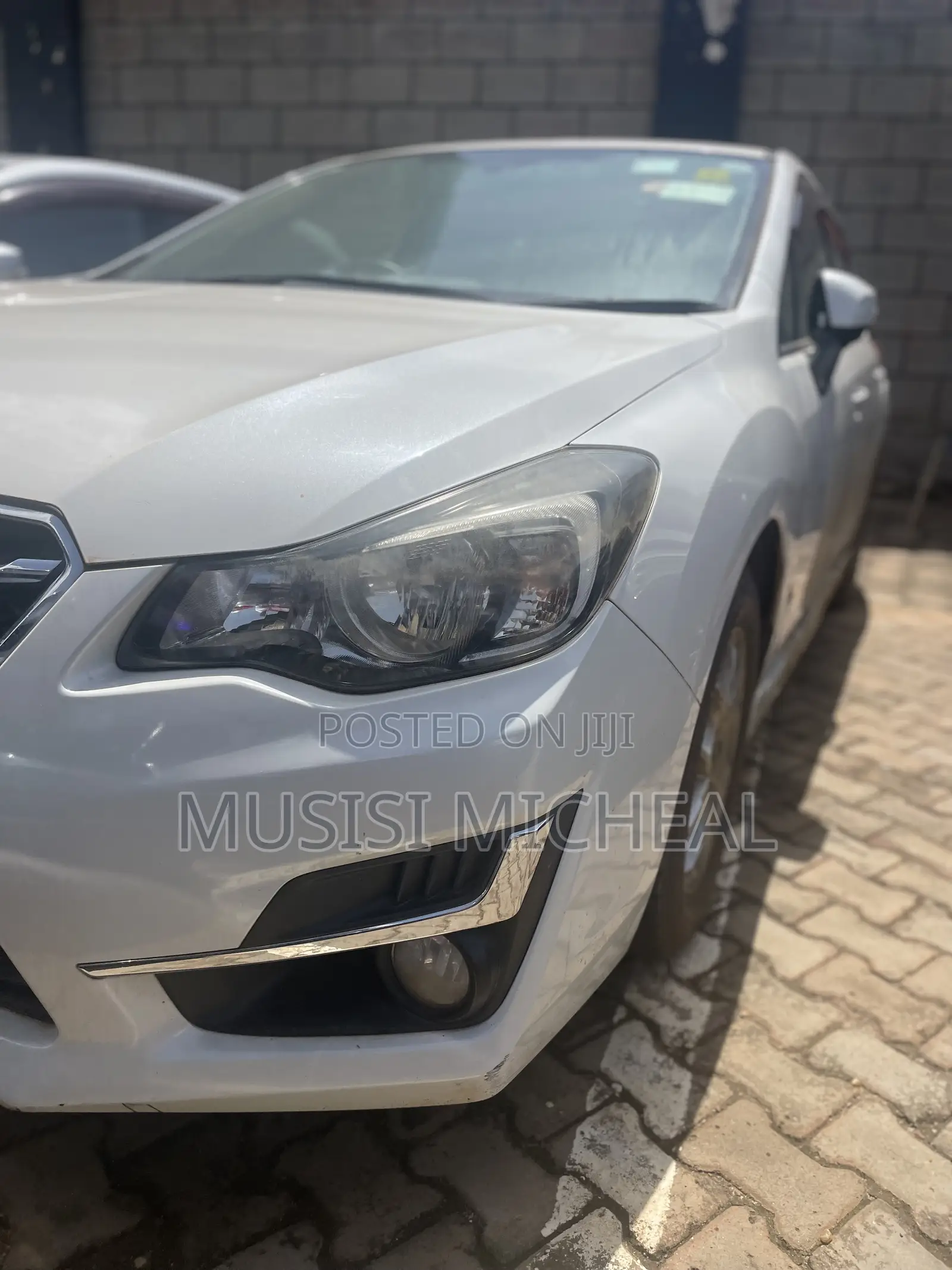 Subaru Impreza 2.0i Sport Premium PZEV 4dr Hatchback AWD (2.0L 4cyl 5M)