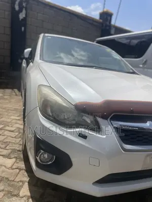 Subaru Impreza 2.0i Sport Premium PZEV 4dr Hatchback AWD (2.0L 4cyl 5M)