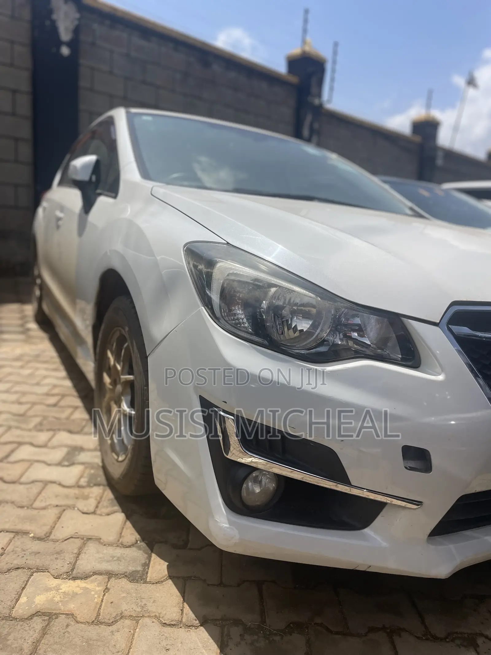 Subaru Impreza 2.0i Sport Premium PZEV 4dr Hatchback AWD (2.0L 4cyl 5M)