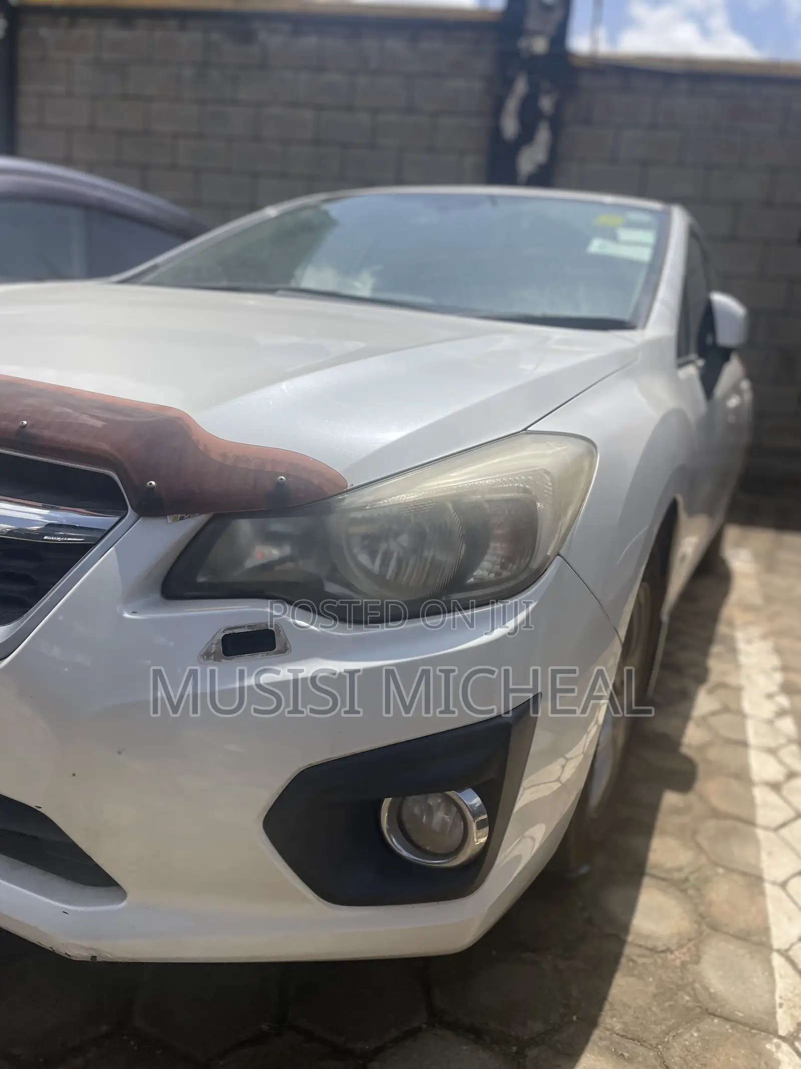 Subaru Impreza 2.0i Sport Premium PZEV 4dr Hatchback AWD (2.0L 4cyl 5M)
