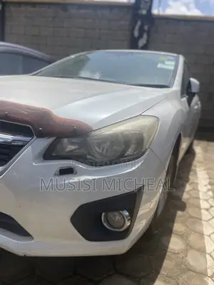 Subaru Impreza 2.0i Sport Premium PZEV 4dr Hatchback AWD (2.0L 4cyl 5M)