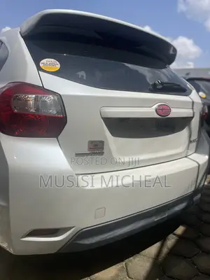 Subaru Impreza 2.0i Sport Premium PZEV 4dr Hatchback AWD (2.0L 4cyl 5M)