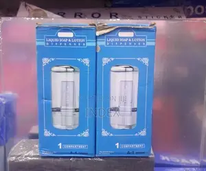 Wall-Mounted Liquid Soap and Lotion Dispenser.