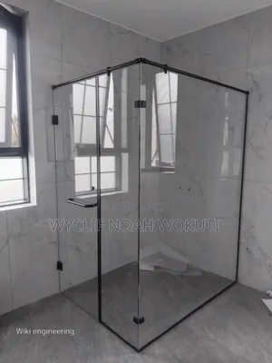 A Clear Shower Cabin With a Swing Door