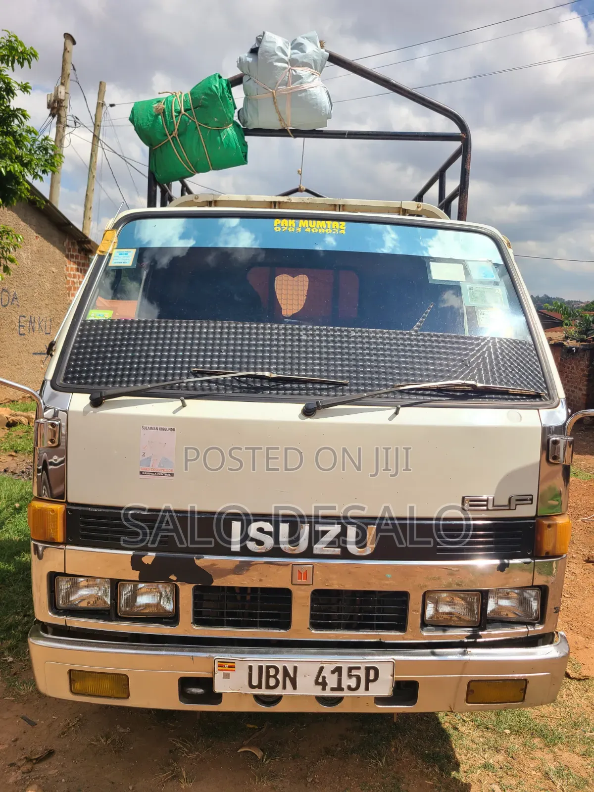 Isuzu Elf 2500 Reg No Ubn 415p White in Color,Big Tyres 700r15