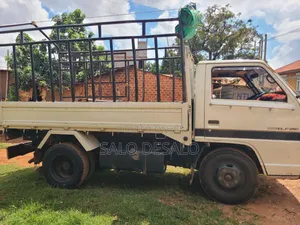 Isuzu Elf 2500 Reg No Ubn 415p White in Color,Big Tyres 700r15