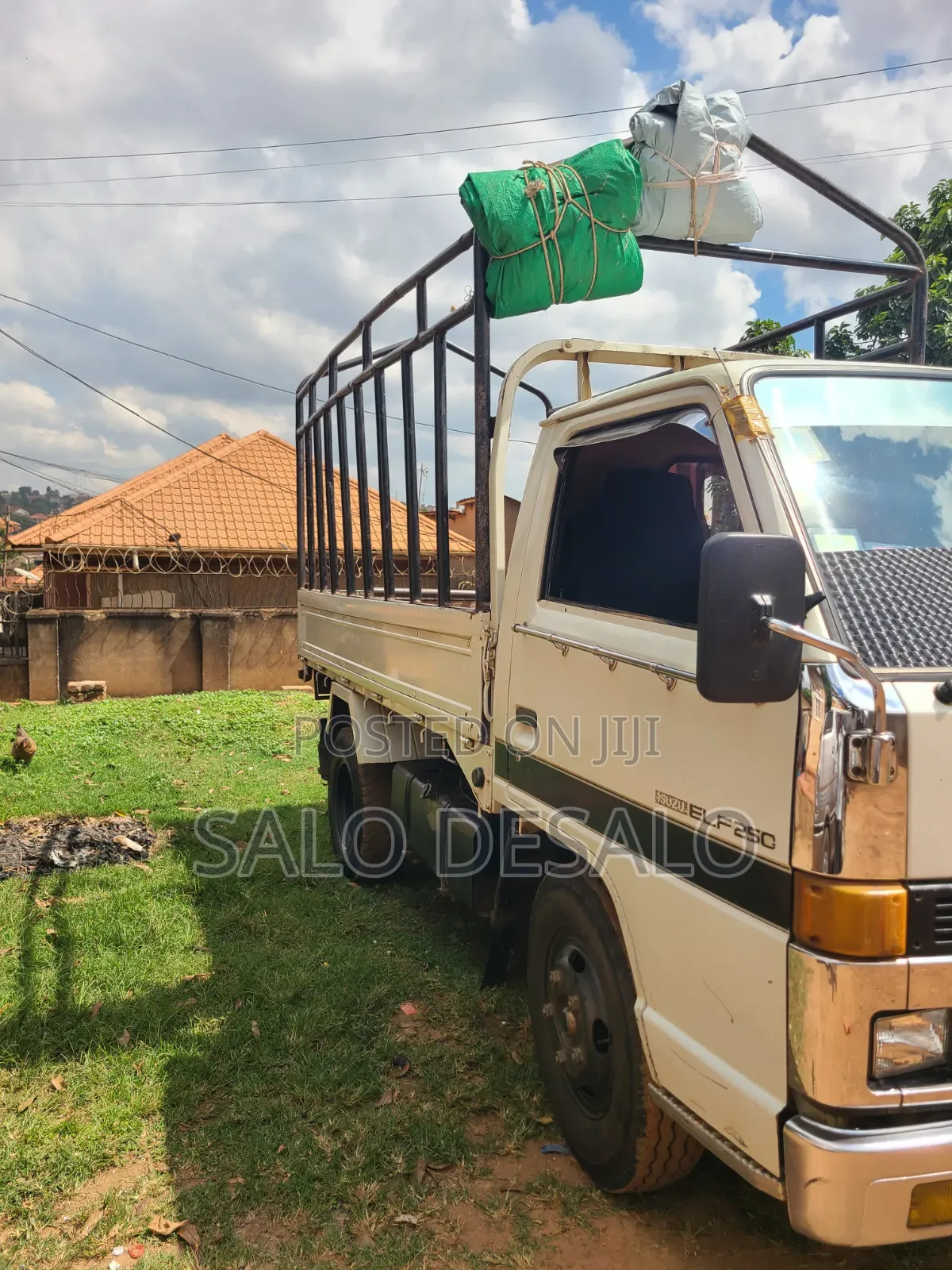 Isuzu Elf 2500 Reg No Ubn 415p White in Color,Big Tyres 700r15