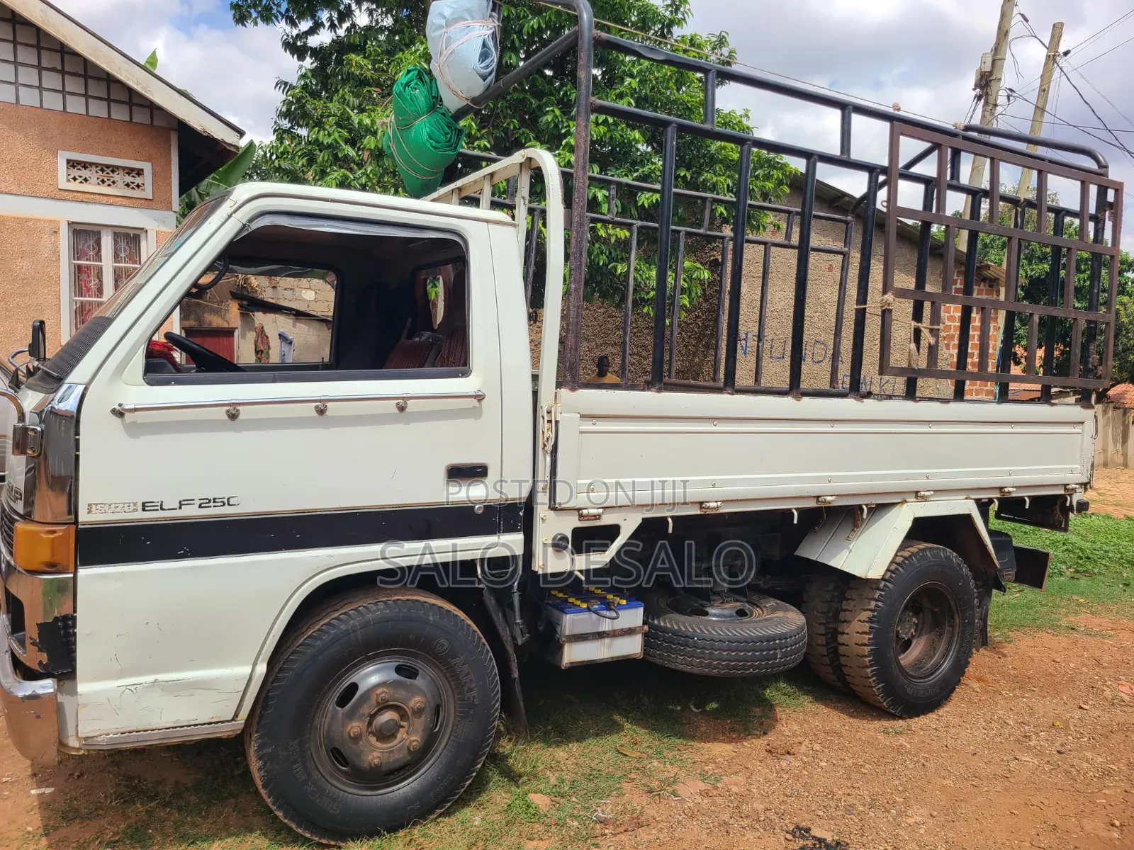 Isuzu Elf 2500 Reg No Ubn 415p White in Color,Big Tyres 700r15
