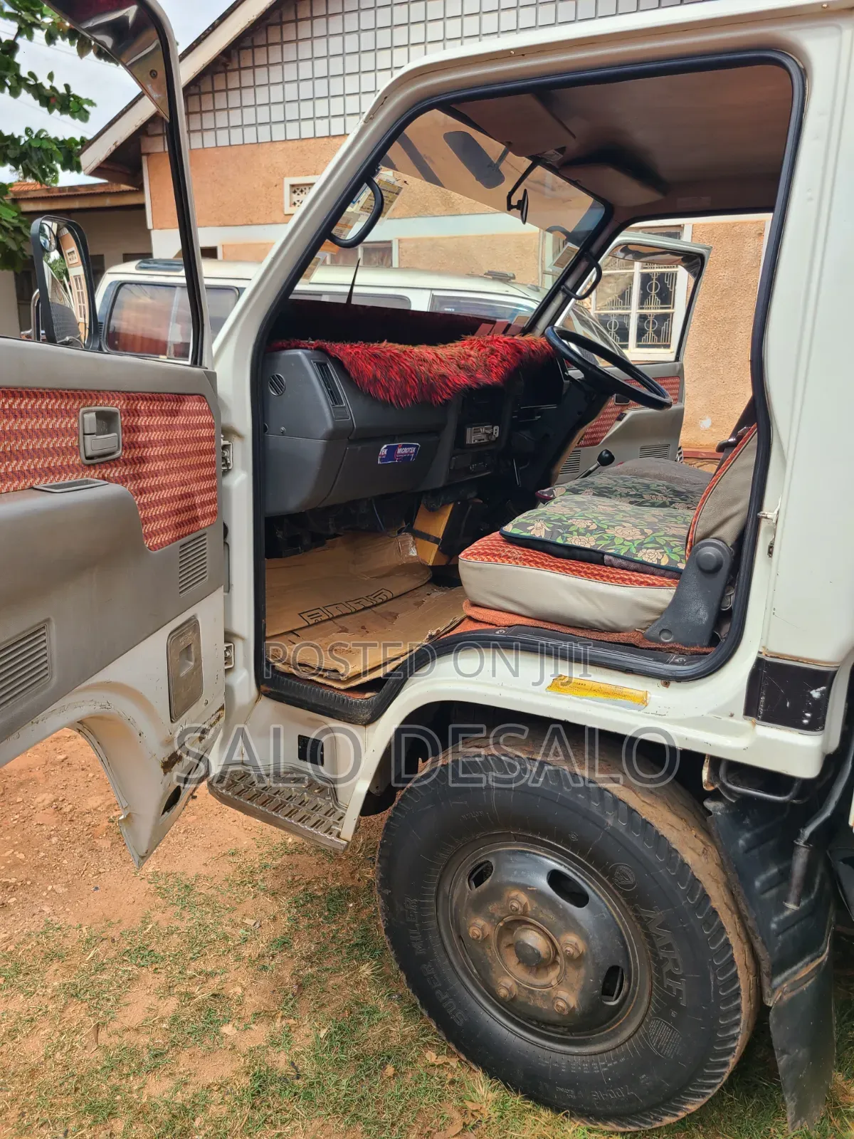 Isuzu Elf 2500 Reg No Ubn 415p White in Color,Big Tyres 700r15