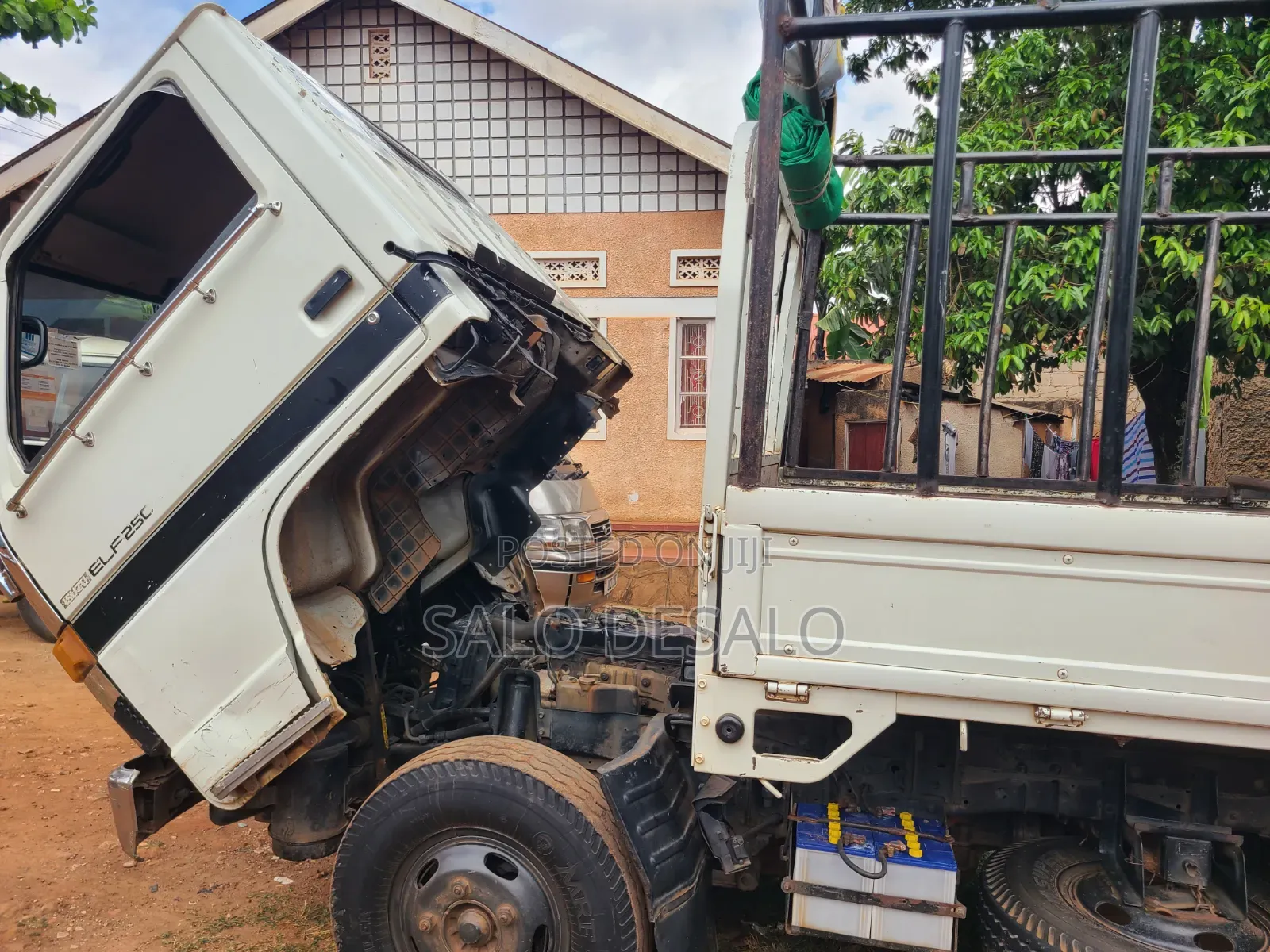 Isuzu Elf 2500 Reg No Ubn 415p White in Color,Big Tyres 700r15
