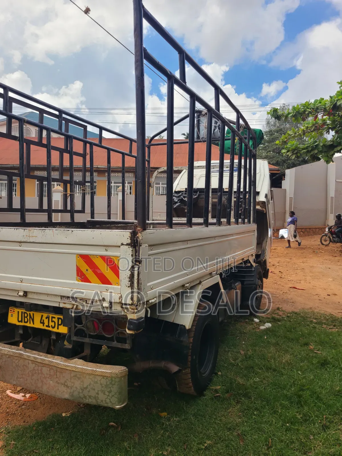 Isuzu Elf 2500 Reg No Ubn 415p White in Color,Big Tyres 700r15