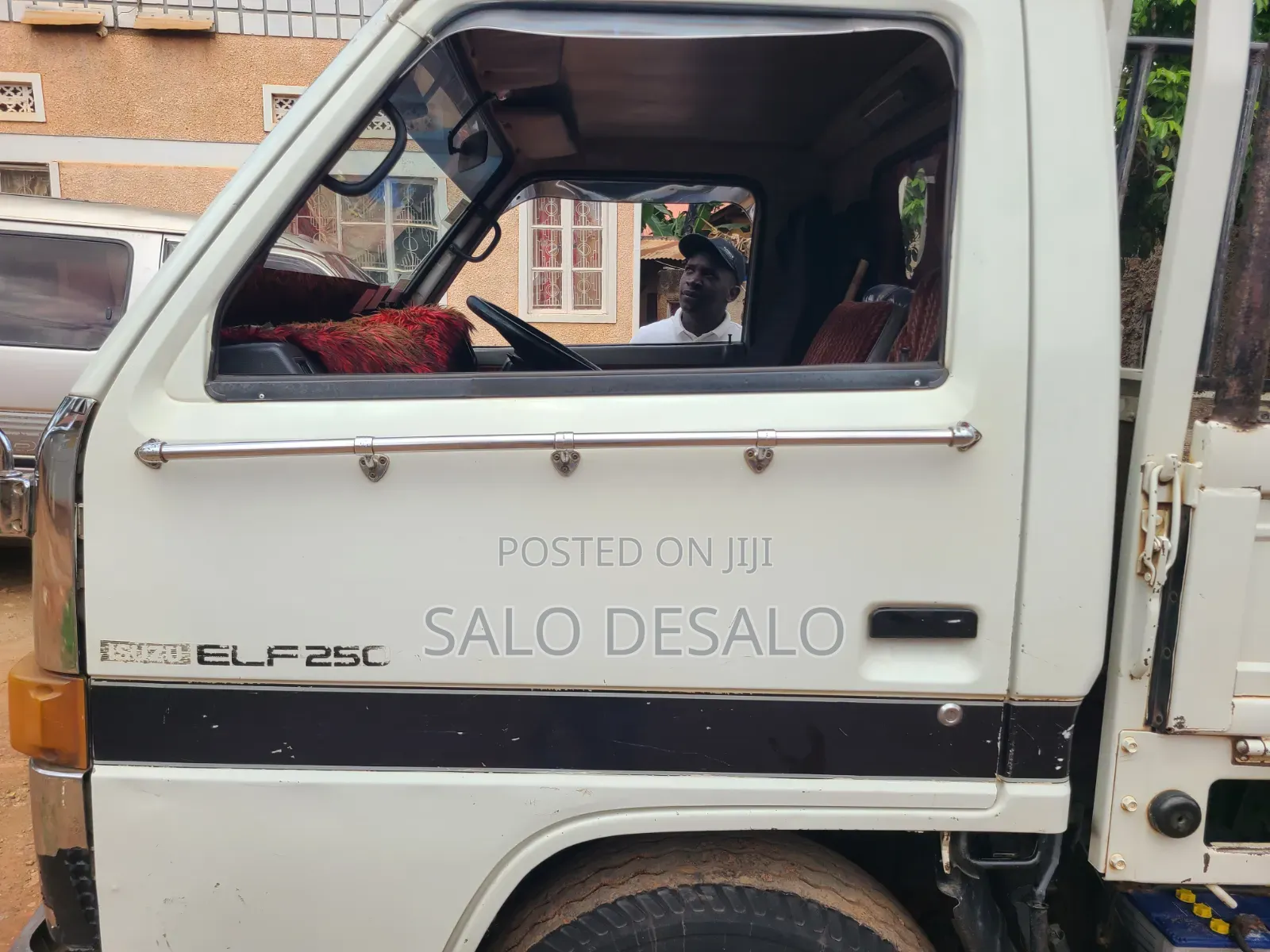 Isuzu Elf 2500 Reg No Ubn 415p White in Color,Big Tyres 700r15