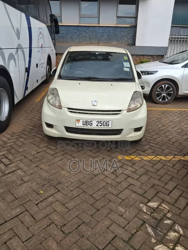 Toyota Passo 1.0 FWD 2009 Pearl