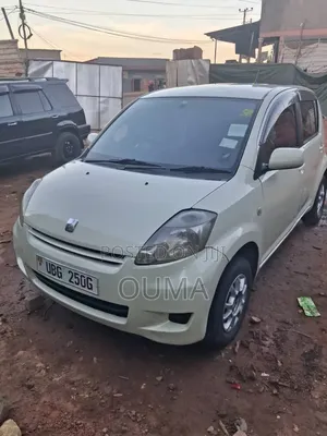 Toyota Passo 1.0 FWD 2009 Pearl