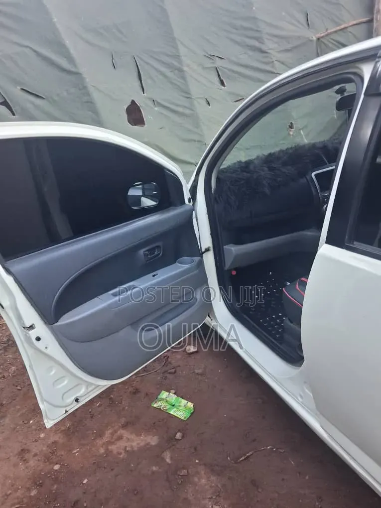 Toyota Passo 1.0 FWD 2009 Pearl